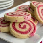 Raspberry swirl cookies with vibrant pink raspberry filling